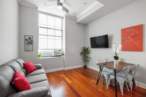 Spacious common area with comfortable seating and modern decor, perfect for relaxing and socializing