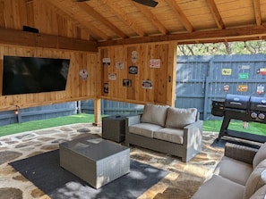 Patio with 65in TV, smoker and grill