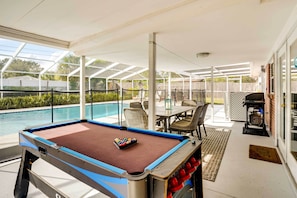 Furnished Lanai | Outdoor Dining Area | Gas Grill | Pool/Air Hockey Table