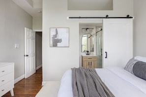 The ultimate retreat after a long day of exploring all that the city has to offer, this getaway is complete with Queen-sized memory foam mattress, plush pillows and modern details throughout the space