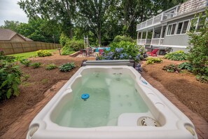 Hot tub open all year and shared with 1 other VRBO on property