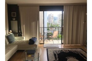 Full wall windows for daylight and mountain/Ala Wai view