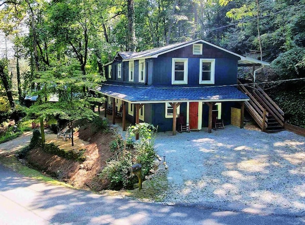 Set in the woods with fire pit, hot tub and less than half a mile from Clayton.
