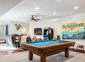 Let the fun begin in our ultimate game room! Enjoy a round of pool, retro arcade games, or simply relax in the cozy seating area with a large TV. Perfect for family and friends to create lasting memories together!