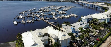 Building 1 foreground with Harborage Yacht Club Marina to the rear side.