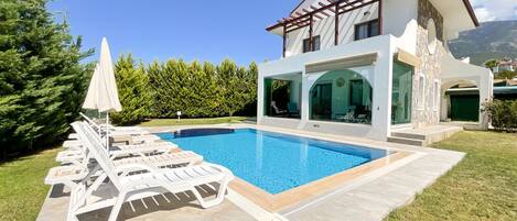 Infront side of the Villa and Pool