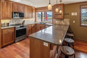 Great kitchen with extra seating.