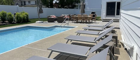 Pool area - updated with new patio and sliding door from kitchen 