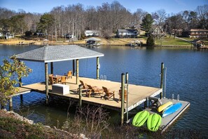 Large dock with kayaks and paddle boards and room for your boat to tie up!