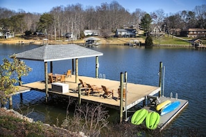 Large dock with kayaks and paddle boards and room for your boat to tie up!