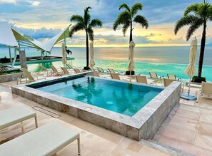 One of  Vallarta's largest infinity pools with a swim-up bar and jacuzzi