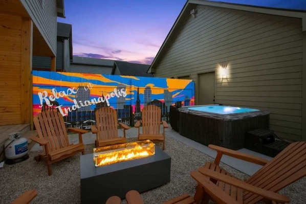 Fire Pit (propane) with Adirondack lounge chairs