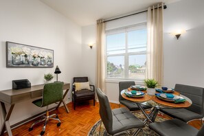 Dedicated work space and dining room that seats 4