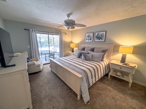 Adjustable Craftmatic bed with large bedroom TV for movie night