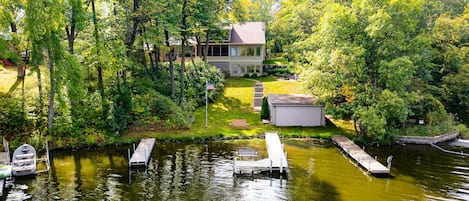 Level lakeshore with 3 docks for tieing up water craft.  Access to boat house.