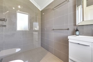 bathroom, with heated floor and rainfall shower
