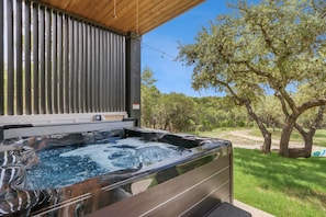 Private hot tub located on the lower deck.