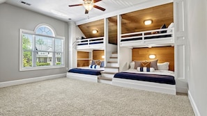 2nd level: Beautiful Bunk Beds! Two kings at the bottom and two singles at the top.