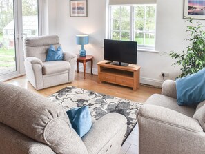 Living room | The Coach House - Grange Farm Holidays, Wootton, near Ryde