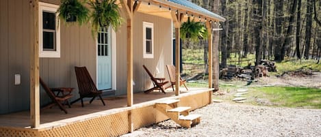 Welcome to our Bungalow in Northern Michigan. Enjoy "Up North" from this peaceful porch.