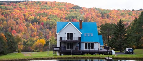 The house looks out to fall hills in all directions. 