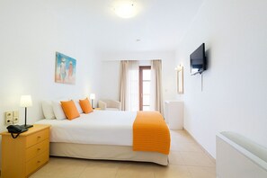 Master Bedroom with a double bed and balcony door
