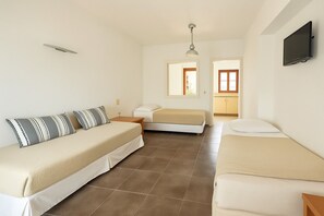Second bedroom with 2 single beds and a sofa bed.