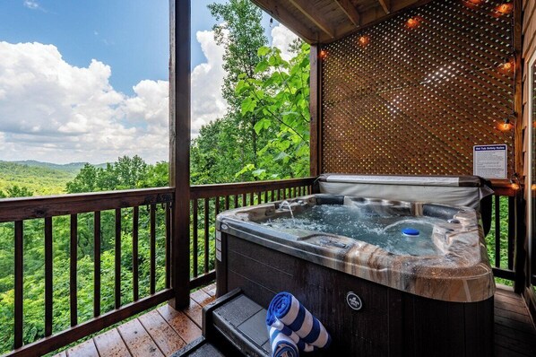 You'll love the secluded and private hot tub with amazing views!