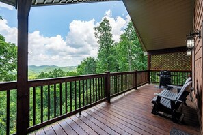 Upper level deck with great mountain views! You'll love the rockers & the grill!