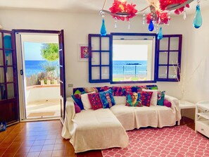 The living room boasting magnificent sea views