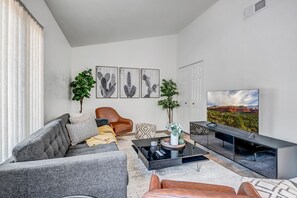 Living Room with Comfortable Seating and Smart TV