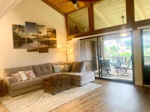 Large open living area with 18' ceilings and plenty of light.   