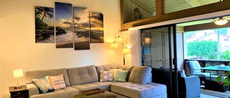 Open living area with high wood ceilings