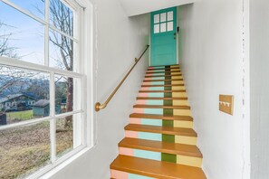 Once inside the yellow door, this groovy staircase greets you :)