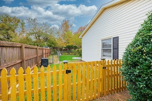 Side yard fence leading to the Garden
