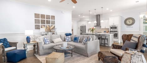 Welcome to 3 Seas! This designer home boasts an open-concept living area designed to impress with its high ceilings, curated interiors, and inviting color palette. Perfect gathering space for spending quality time with your crew!