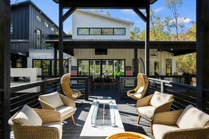 Over 1500sf of patio space! This part is over the creek. Lots of outdoor seating!