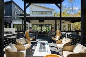 Over 1500sf of patio space! This part is over the creek. Lots of outdoor seating!