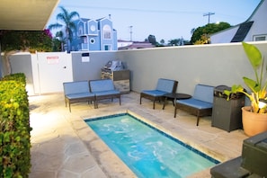 Relax in the 8 person spa after a long beach day