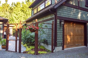 Park in front of the Garage Door and Enter the Walkway through the Gate