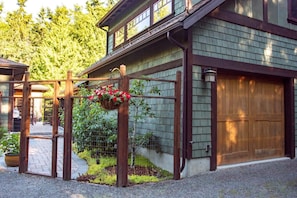 Park in front of the Garage Door and Enter the Walkway through the Gate