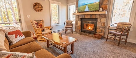 Get cozy in the warm and inviting living room