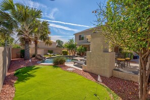 Roll some putts on our putting green by the pool