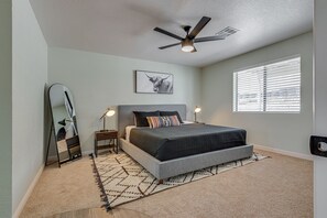 Master bedroom- King bed, Large Smart Tv, walk in closet, own bathroom.