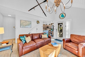 Enter this open floor plan with soaring ceilings.