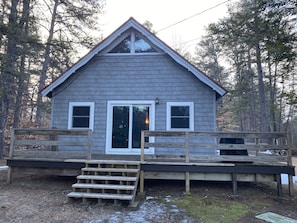 View of Cozy Cabin with wrap around deck