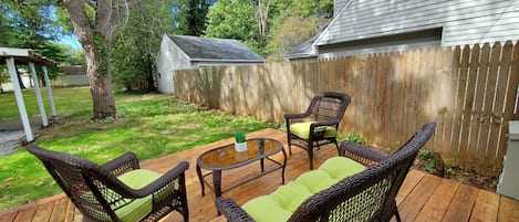 Relaxing large backyard with beautiful deck 