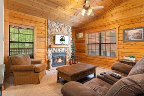 Living Room with Cable TV and Seasonal Fireplace