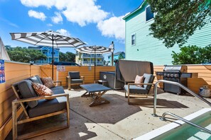 Outdoor grilling area with hot tub