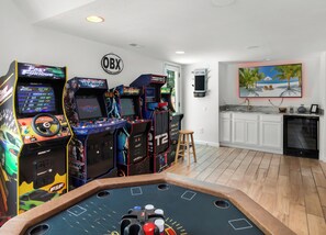 Have some fun in the cozy Game Room with a Card Table and classic Arcade Games that's perfect for letting off some steam with the family with some friendly competition.
